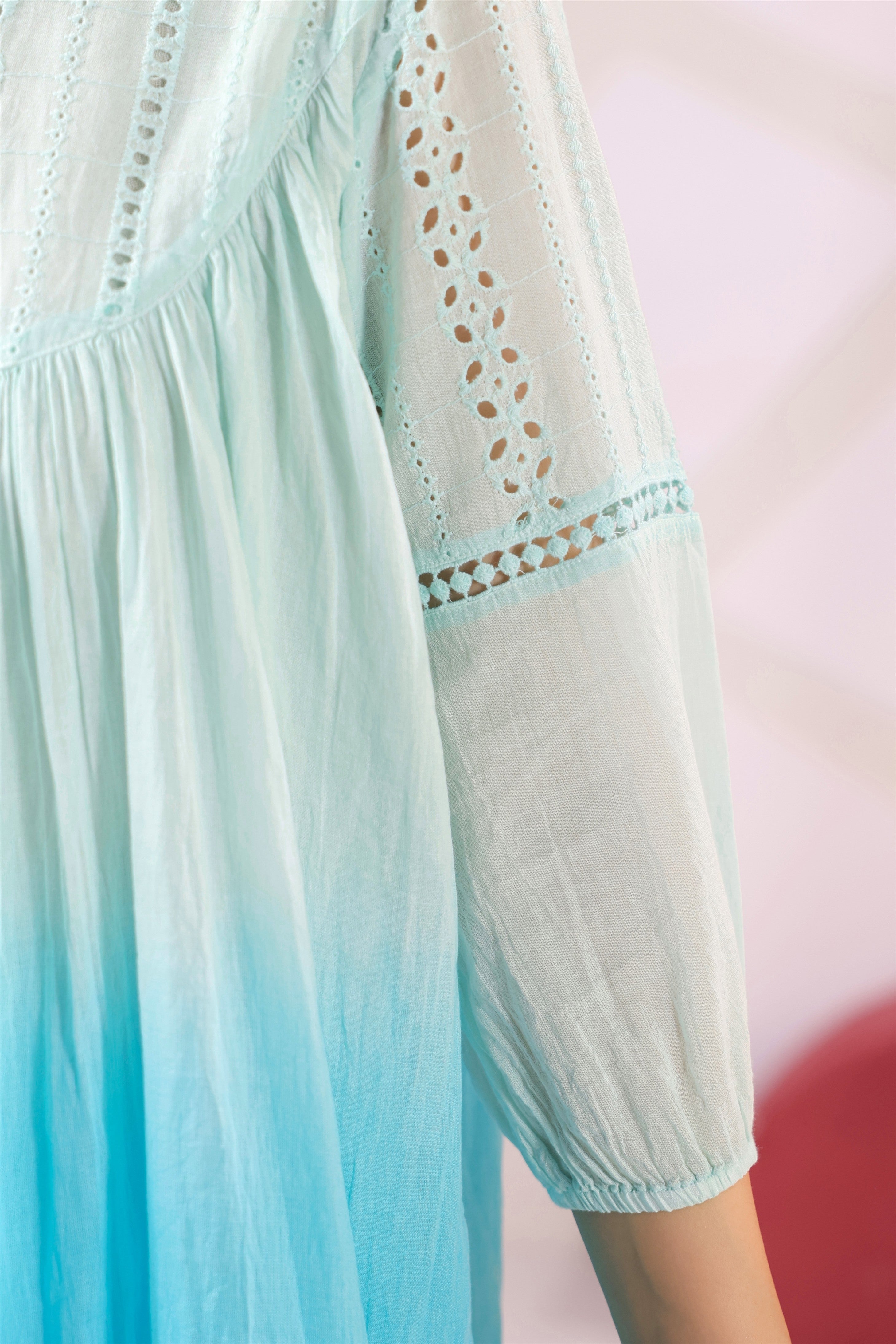 Woman wearing a premium sky blue ombre cotton co-ord set featuring a relaxed-fit tunic with lace detailing, shirt collar, three-quarter sleeves, and matching straight-fit pants, perfect for casual and summer wear.